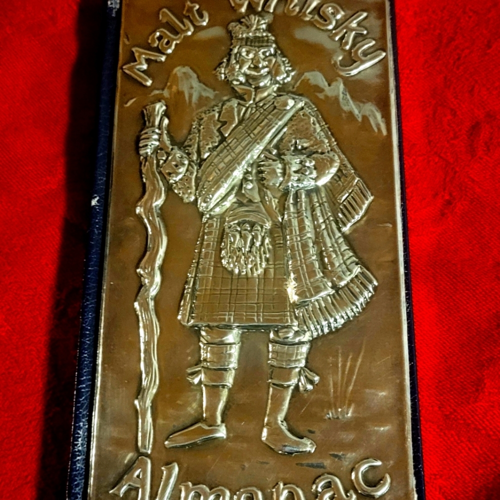 Malt Whiskey Almanac sterling cover book bound in leather.